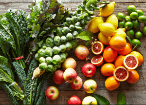 a group of fruits and vegetables on a wood surface Healthy Weight Loss Diets Didcot
